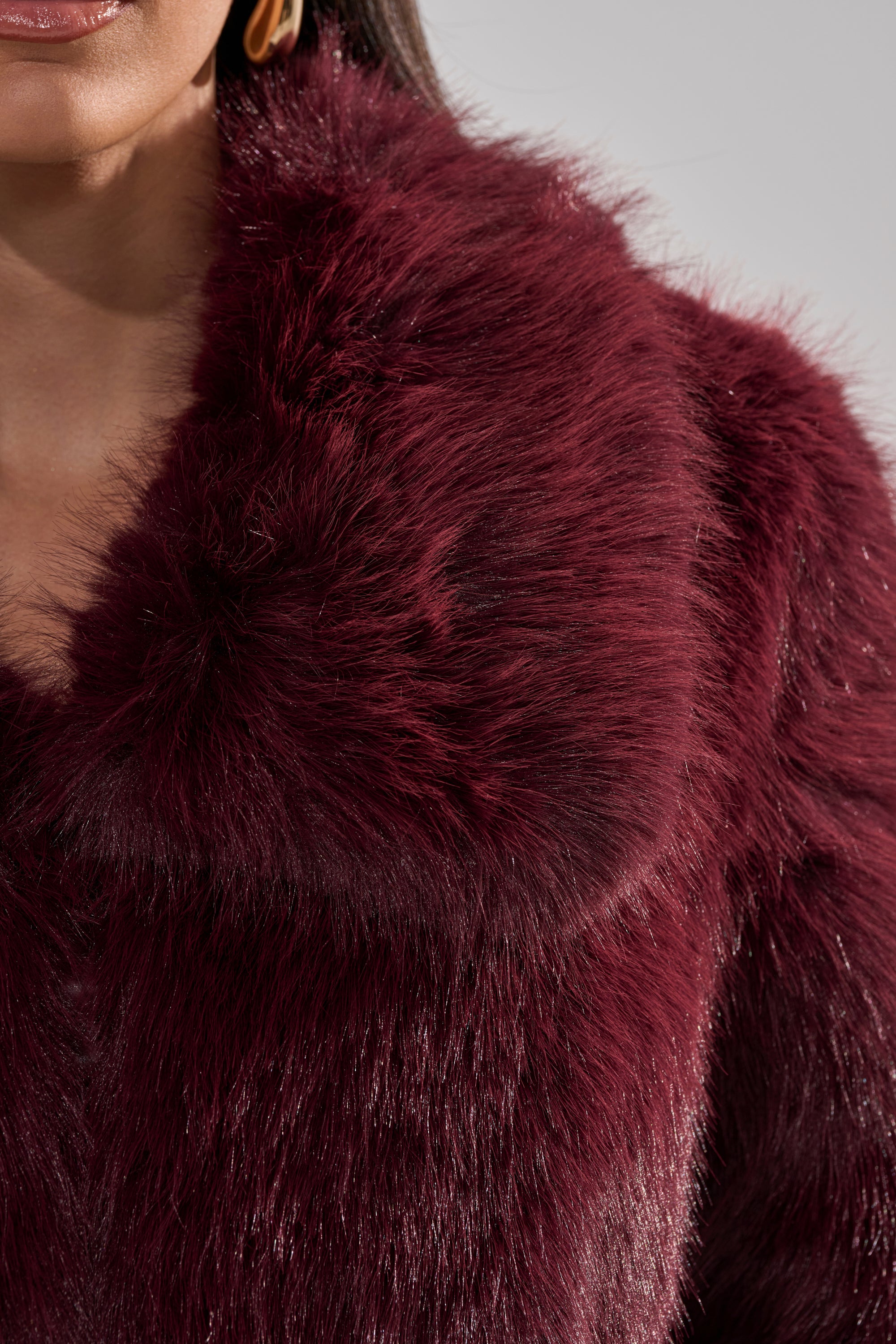 CADENCE FAUX FUR IN BURGUNDY