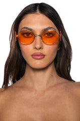 CONTEMPORARY ART RIMLESS SUNNIES IN ORANGE